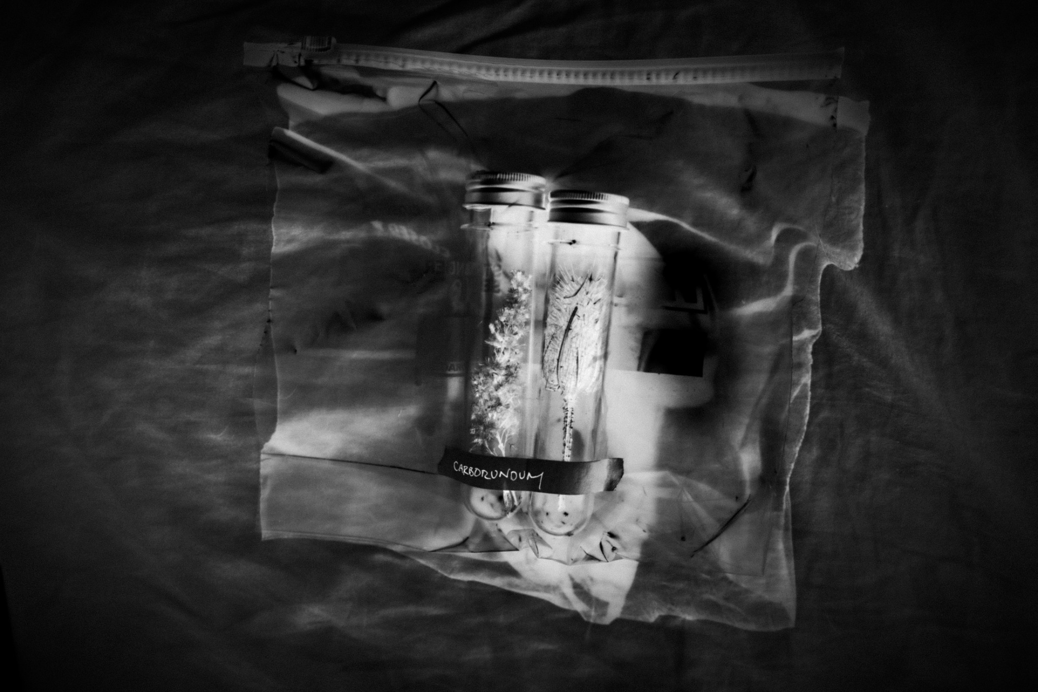 X-ray-like still life of Carborundum sample jars